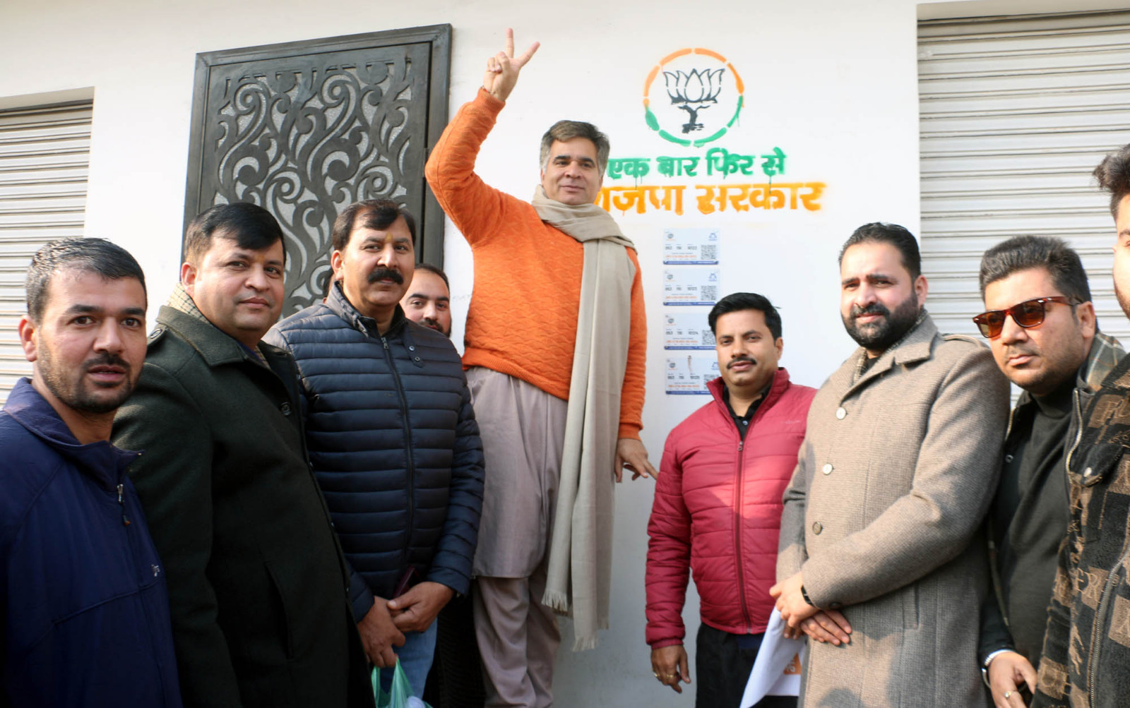 Ravinder Raina starts BJP wall writing campaign in J&K, draws party symbol